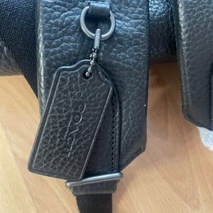 Coach black leather book bag never used